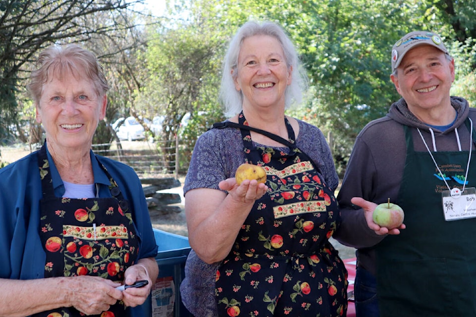 Anne Gosse with friends and volunteer at the 17th annual Heritage Apple Day. (Tanmay Ahluwalia/Langley Advance Times)