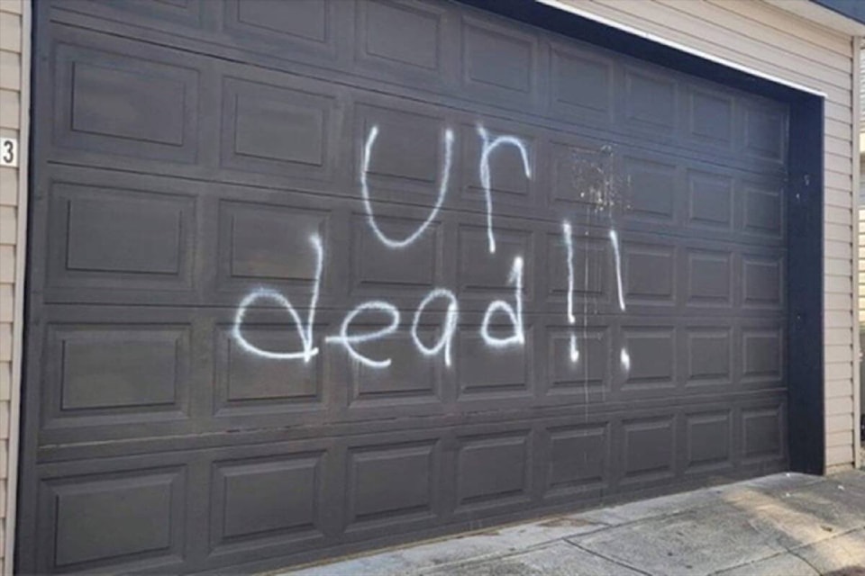 30579887_web1_221006-SUL-garageThreat-graffiti_1