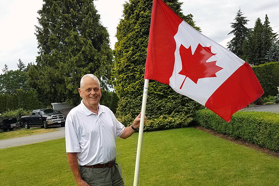 30599285_web1_220624-LAT-TA-CanadaDayRotaryFlag-_2