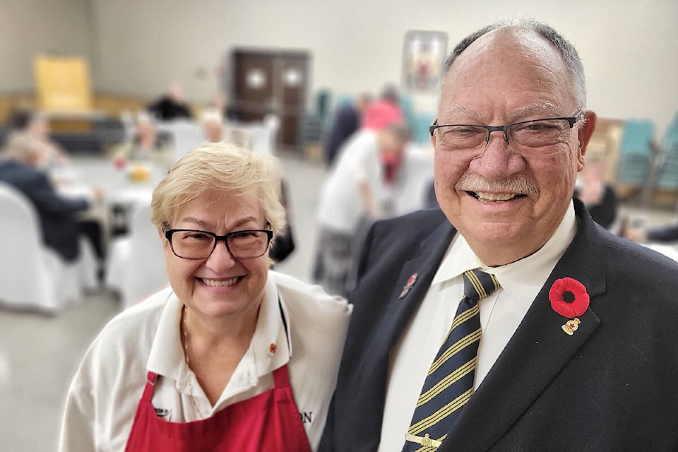 Aldergrove Legion Ladies Auxiliary president Barb Burkett and Legion Service officer Doug Hadley welcomed veterans to a pre-Remembrance Day dinner at the Aldergrove branch on Sunday, Oct. 30. (Dan Ferguson/91ԭ Advance Times)