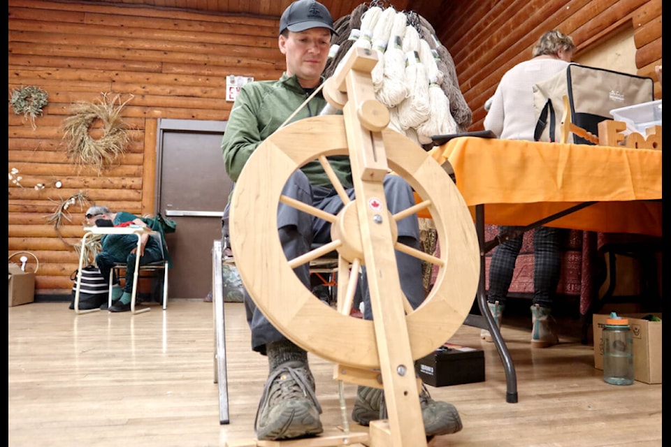 Jeff Birch, a Maple Ridge resident brought is spinning wheel to the Langley Weavers’ and Spinners’ Guild show and sale. (Tanmay Ahluwalia/Langley Advance Times)