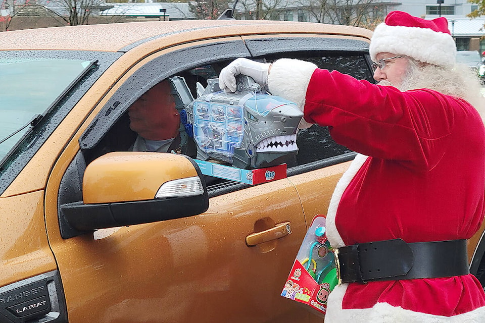 Just over 100 participants brought new, unwrapped toys to the 39th annual Kruise For Kids toy drive on Sunday, Nov. 6 at the Kwantlen Polytechnic University parking lot in Langley City. (Dan Ferguson/Langley Advance Times)