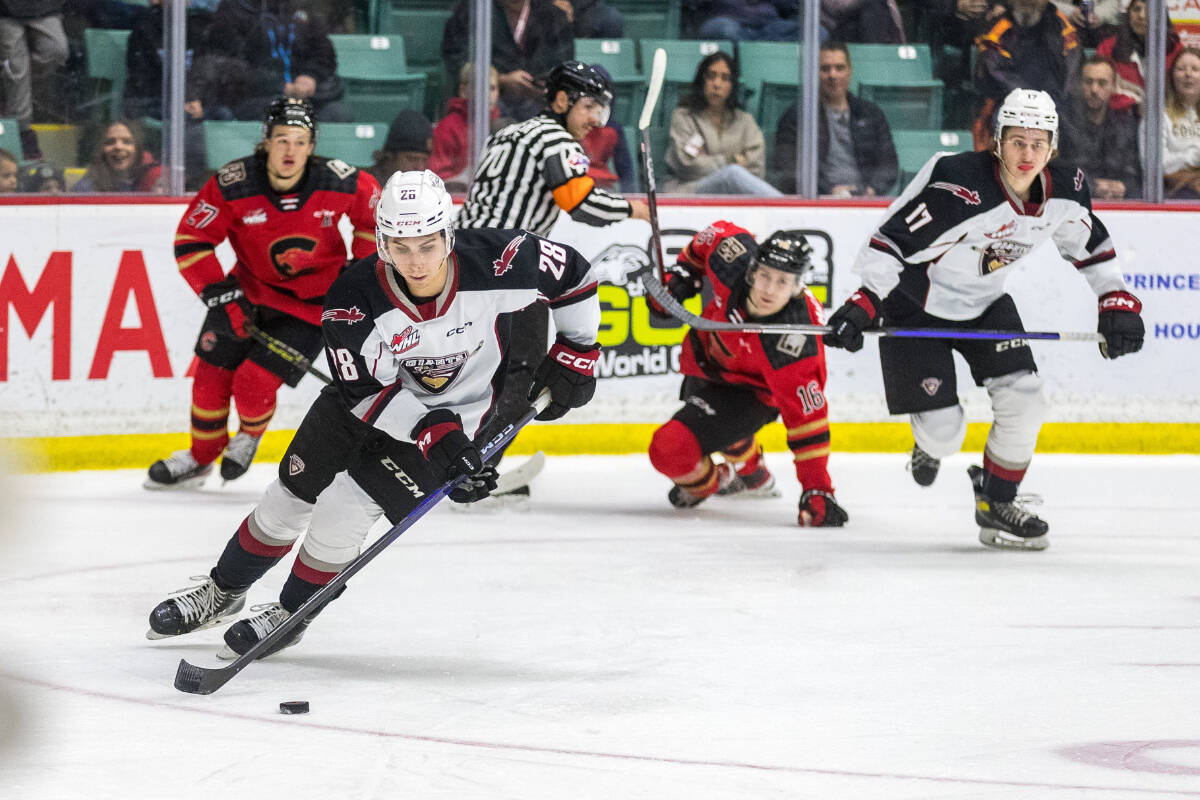 Giants player Julian Cull took possession of the puck during SundayÂ’s (Nov. 13) game against the Cougars in Prince George. Cougars won, 6-4. (James Doyle/Special to 91Ô´´ Advance Times)