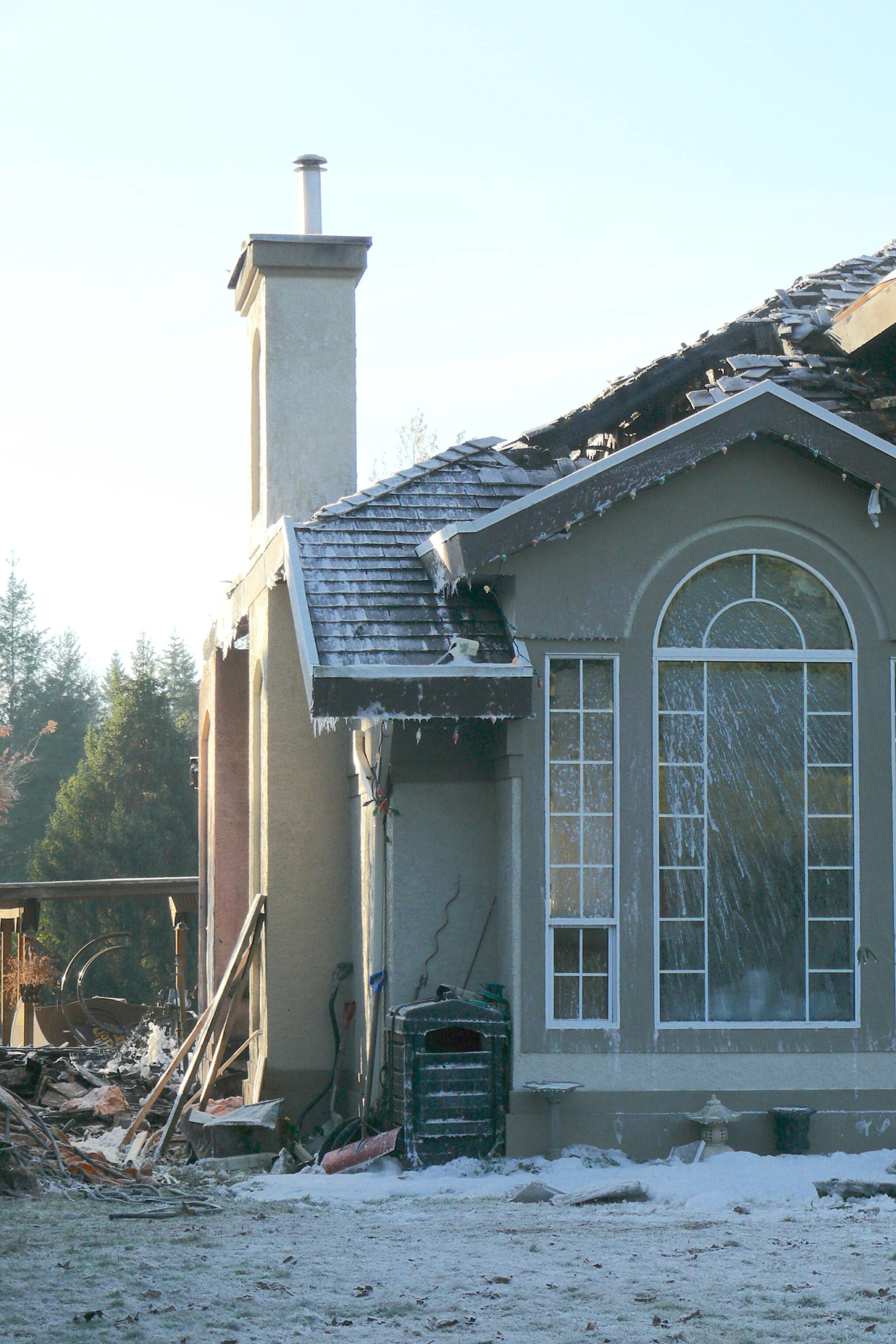 Aftermath of house fire in the 20100 block of 24th Avenue on Nov. 18, 2022. (Dan Ferguson/Langley Advance Times)