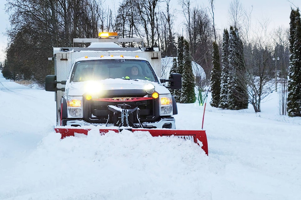 A truck plowing snow in Aldergrove on Tuesday, Dec. 20. (Dan Ferguson/Langley Advance Times)