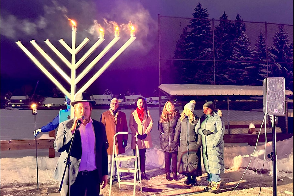 Rabbi Bentzion Schtroks led the Menorah lighting ceremony at the West 91ԭ Hall in Walnut Grove on Tuesday, Dec. 20. (Special to 91ԭ Advance Times)