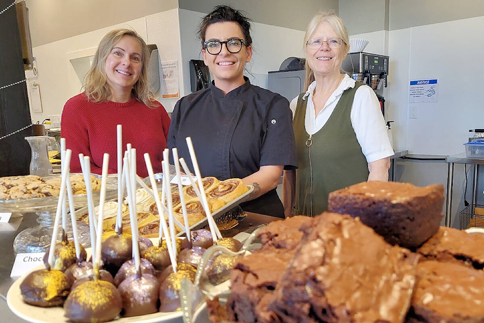 Langley Meals On Wheels Services Society executive director Shannon Woykin (left), chef Jessica Lemay (centre) and cafe co-ordinator Karen Long showed off some of the tempting treats Wednesday, Jan. 4, at the just-opened Firehouse Cafe at Aldergrove Community Station House in the 2900-block of 272nd Street. Funds raised by the venture support the non-profit Langley Meals On Wheels. (Dan Ferguson/Langley Advance Times)