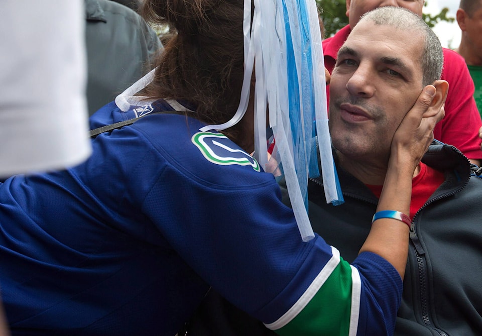 Canucks remember Gino Odjick with First Nations jersey