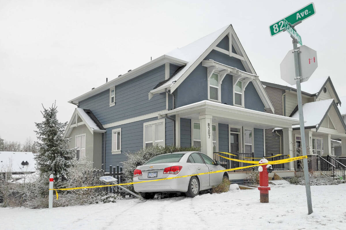 A vehicle hit the front corner of a house in the Yorkson neighourhood Tuesday, Jan. 31, 2023. (Dan Ferguson/Langley Advance Times)
