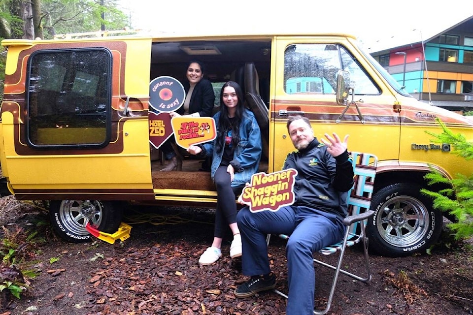 Hotel Zed Tofino staff Jennie Foster, left, Ki Berentsen and Myles Beeby pose with the new amenity parked at the back of the property. (Nora O’Malley photo)