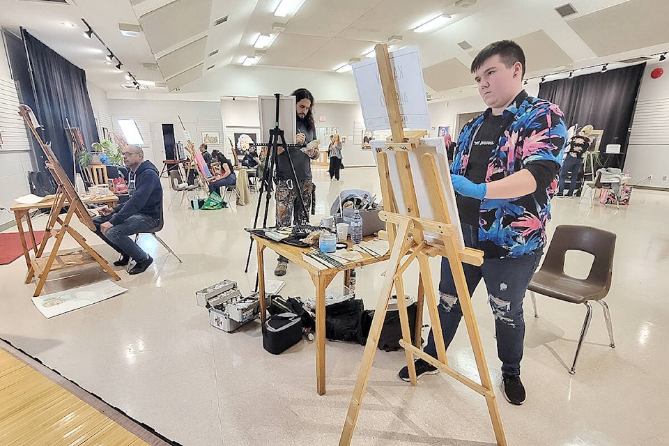 Nine artists had four hours to create portraits of three sitters at the Aldergrove Kinsmen hall gallery on Sunday, Feb 5, with the second B.C. Wide Portrait Competition hosted by the Langley Arts Council. (Dan Ferguson/Langley Advance Times)
