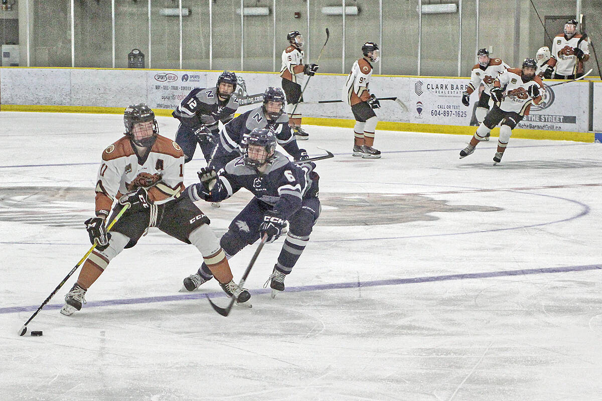 Kodiaks defenceman Ryan Sullivan and a North Van player battled for puck possession at their last home game, on Feb. 8 at the Aldergrove Credit Union Community Arena. (Kurt Langmann/Special to 91Ô´´ Advance Times)