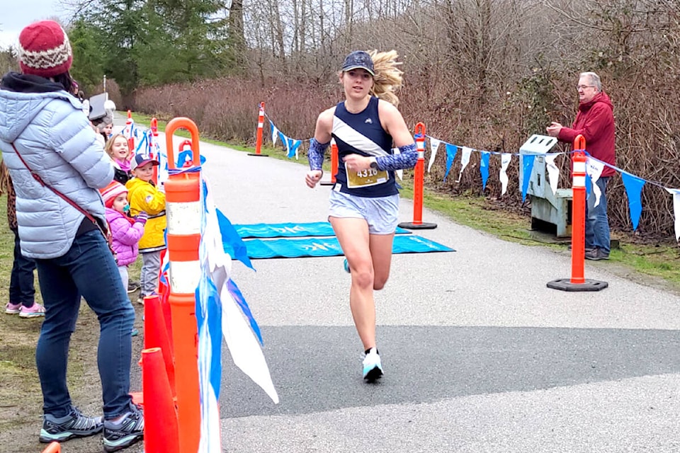 31933647_web1_230221-LAT-TAHalfMarathon_8