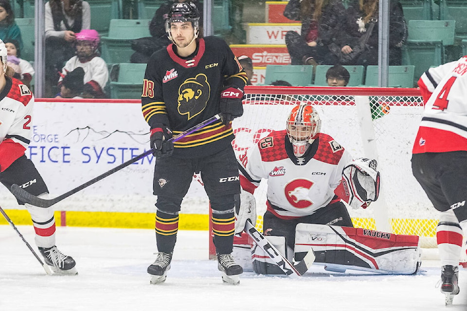 Giants Colton Langkow set up in front of Cougars goalie Tyler Brennan Tuesday night, waiting to get a shot in. Brennan was unbeatable as Prince George blanked Vancouver 6-0 at the CN Centre. (James Doyle/Special to Langley Advance Times)