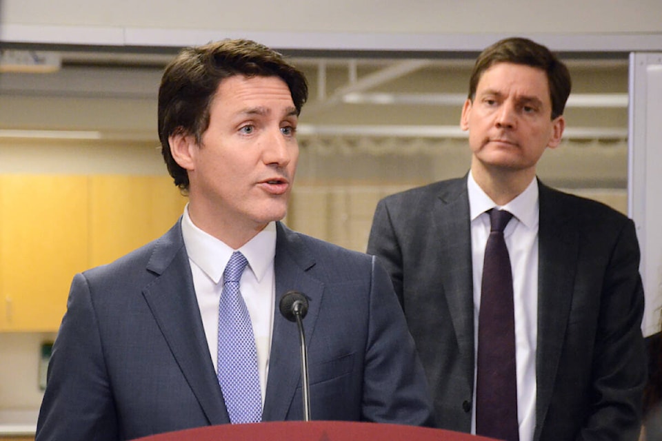 32009592_web1_230301-LAT-MC-TrudeauEby1