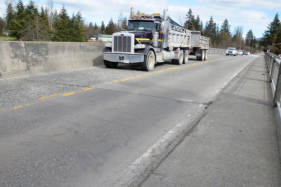 32071791_web1_230308-LAT-MC-GloverRoadOverpass