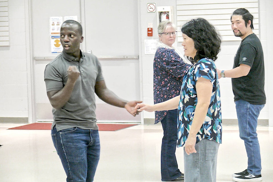 An instructor from the Rock Step Swing Dance Society explained the art of the Lindy Hop at the Aldergrove Kinsmen Community Centre on Saturday, March 11. It was part of a two-day Celebration of Culture, a free family-friendly event organized by the 91ԭ Arts Council. (Dan Ferguson/91ԭ Advance Times)