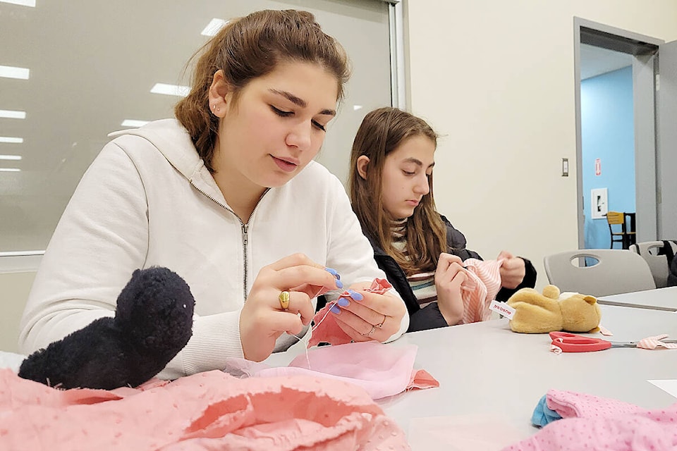 ‘An introduction to miniature fashion design and alterations’ drew more than 20 people to the 91ԭ City branch of the Fraser Valley Regional Library to try their hand at making clothing for dolls and plush toys on Saturday, March 25. (Dan Ferguson/91ԭ Advance Times)