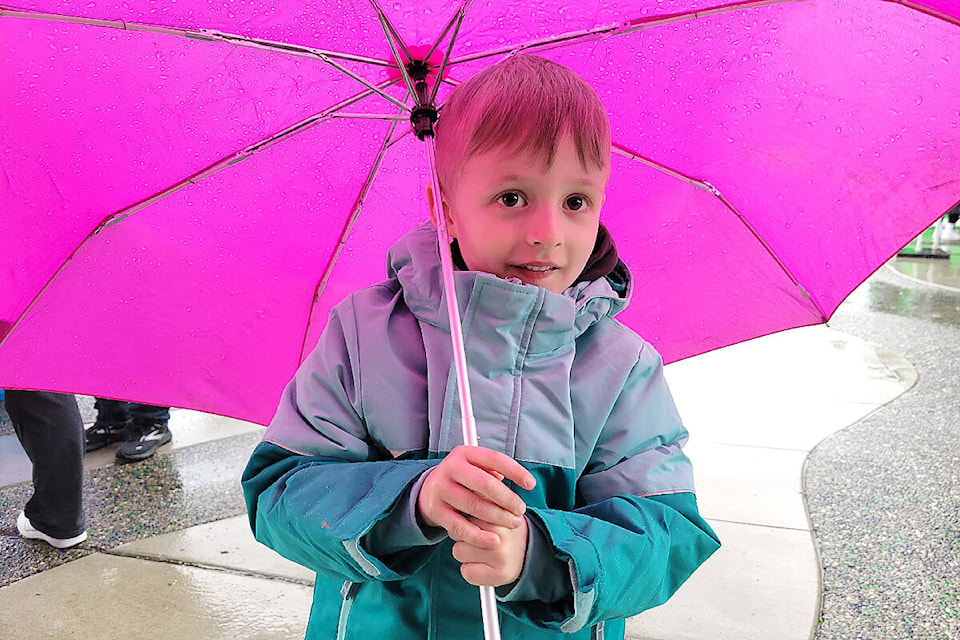 Fred brought his umbrella to Seedy Saturday at Derek Doubleday Arboretum on March 25. Despite the inclement weather, a record 500 turned out. (Dan Ferguson/Langley Advance Times)