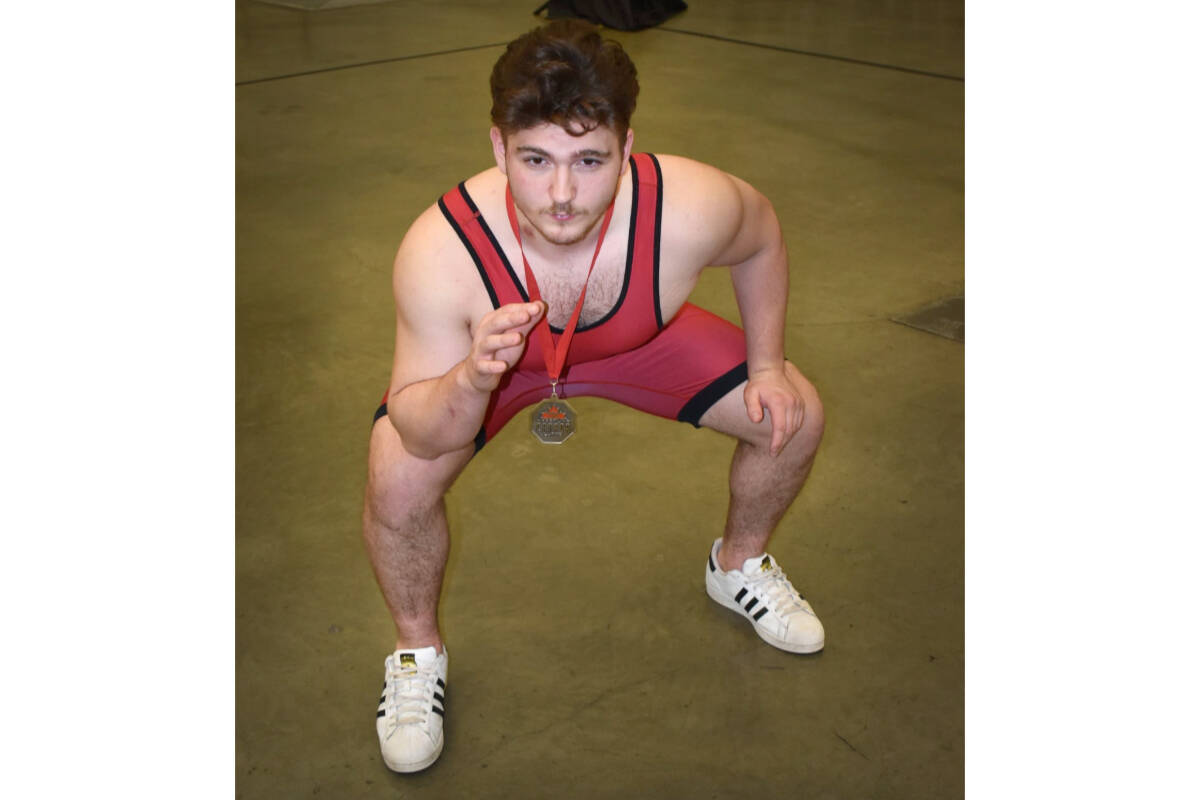 32297311_web1_230330-LAT-HC-McEwenNatWrestlingChamp-._7