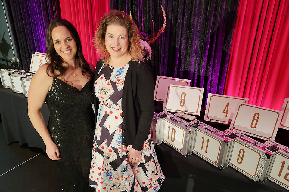 Roslyn Henderson, executive director of Big Brothers Big Sisters of Langley (left) and Olivia Olczak Day of Day Media Consulting Inc. presided over the Big Deal Game Show, a unique spin on the TV show Deal or No Deal, at the third fundraiser for the agency’s mentoring programs, held Saturday, April 22 at the Cascades Casino Langley Hotel and Convention Centre. (Dan Ferguson/Langley Advance Times)