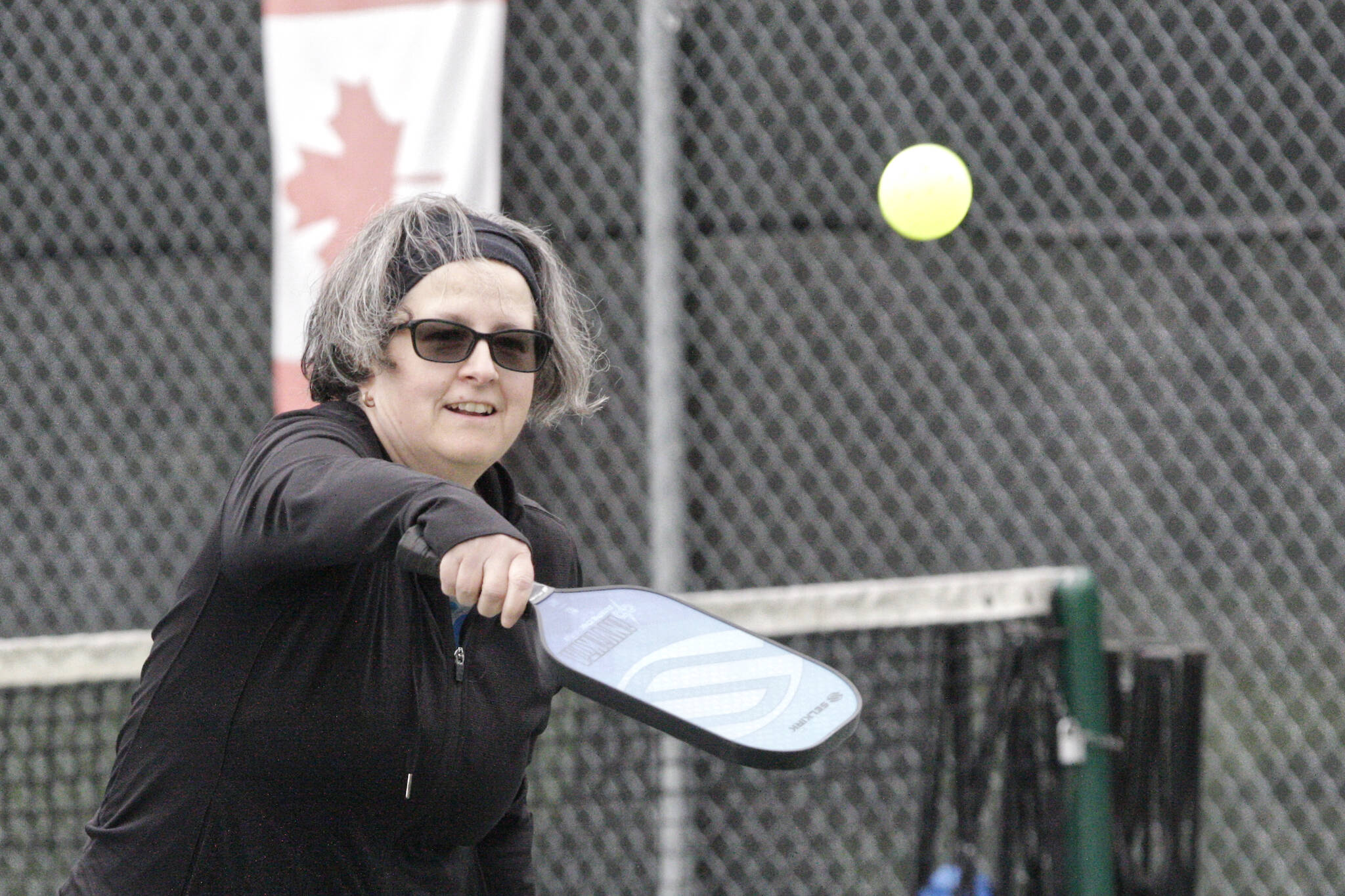 A Douglas Park group pickleball player returns a serve. The group has grown to 220 members, part of the fastest-growing sports in Canada, with an estimated 1 million Canadians who play at least once a month. (Dan Ferguson/Langley Advance Times)