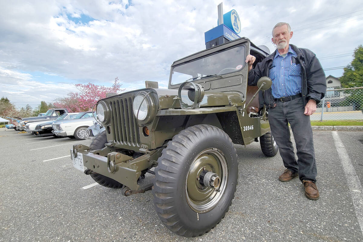 Aldergrove resident Tom Wiebe brought his restored 1952 Jeep to the ninth annual Country Car Show at the Aldergrove Community Secondary School on Sunday, April 30. Next year, organizers are thinking about moving to nearby playing fields where there is more room. (Dan Ferguson/Langley Advance Times)
