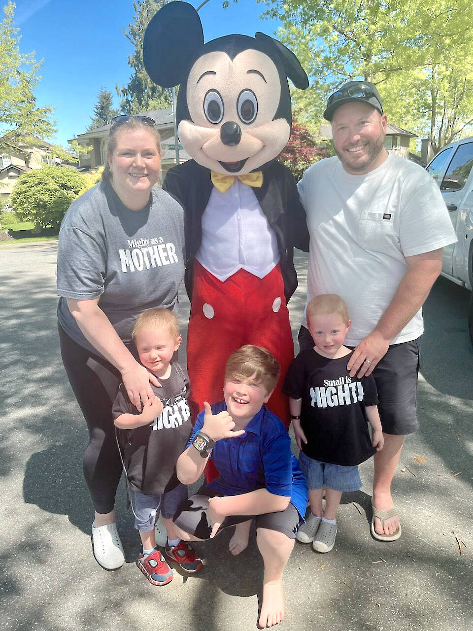 For Mothers Day, Mickey Mouse dropped by to visit Langleys Alisha Openshaw and her boys. (Special to Langley Advance Times)
