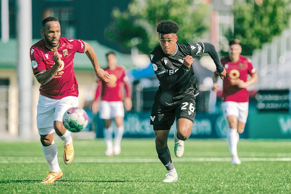Number 26, 16-year-old midfielder TJ Tahid, had a good game as Vancouver FC fought Valour to a scoreless draw in Langley on Sunday night, May 28. (Vancouver FC/Beau Chevalier/Special to Langley Advance Times)