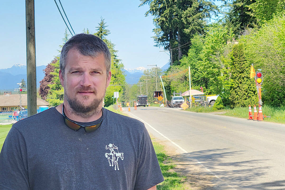 Langley Township Councillor Rob Rindt is shown in front of the Trans Mountain trenchless pipeline project at 240th Street, between 80th and 72nd, next to his family farm, after traffic was restricted because a sinkhole had formed. (Langley Advance Times file)