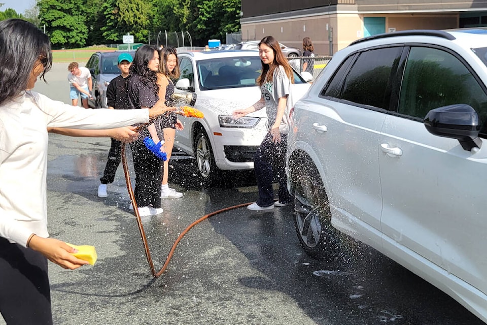 WGSS Grade 12 students washed cars by donation to raise funds for their dry grad on Saturday, May 27. (Kyler Emerson/91ԭ Advance Times)