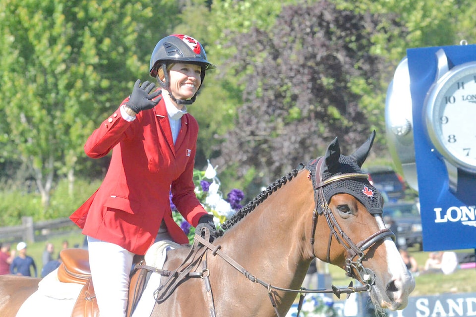 Langley’s Tiffany Foster smiled and waved as fan applauded Team Canada, which finished second to Ireland at the $400,000 Longines FEI Jumping Nations Cup of Canada at Thunderbird Show Park. (Dan Ferguson/Langley Advance Times)