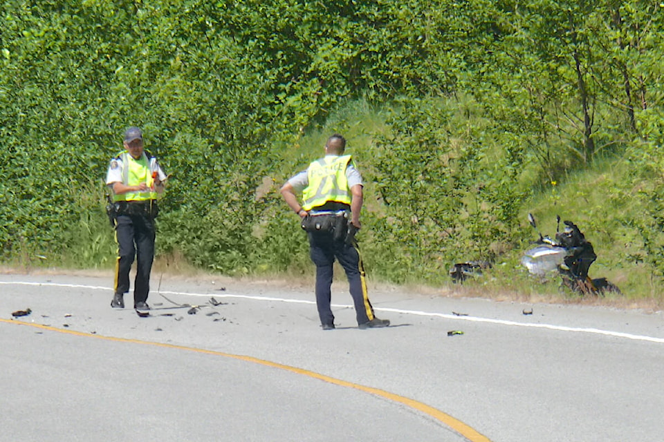 A two-vehicle crash involving a motorcycle closed University Drive between Glover Road and 216th Street in Langley for more than an hour Tuesday morning, June 6. (Dan Ferguson/Langley Advance Times)