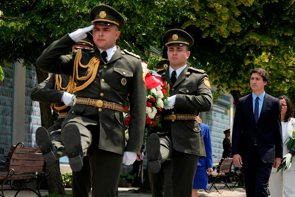 Prime Minister Justin Trudeau arrives at the memorial wall outside of St. Michael’s Golden-Domed Cathedral in Kyiv, Ukraine, on Saturday, June 10, 2023. THE CANADIAN PRESS/Frank Gunn
