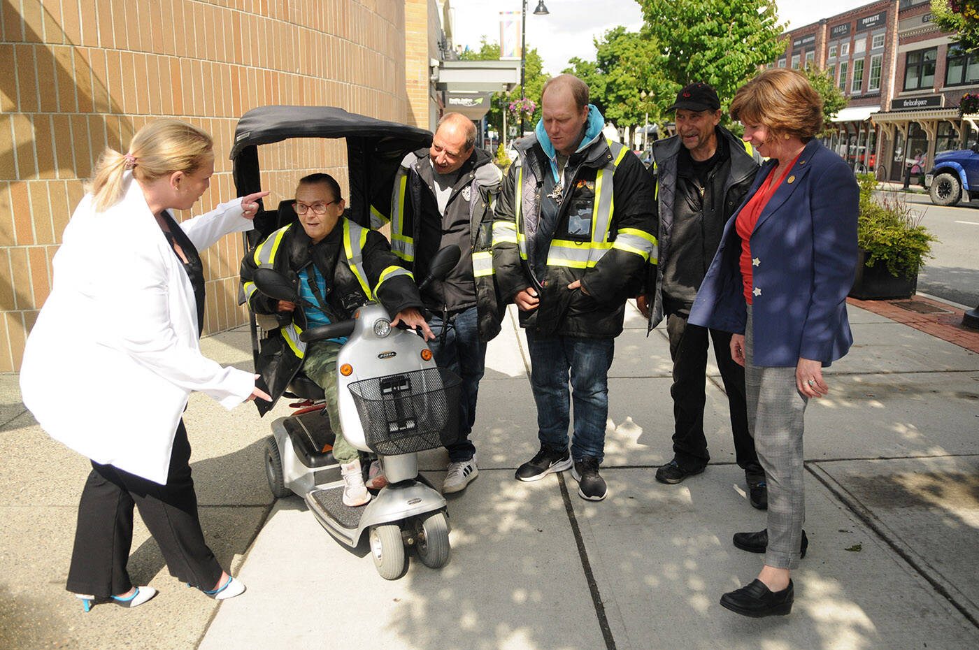 Minister of social development and poverty reduction, Sheila Malcolmson (right) and Kelli Paddon, MLA for Chilliwack-Kent (left) chat with members of Ruth and Naomi聮s Downtown Chilliwack Street Team following a funding announcement in Chilliwack on Tuesday, June 13, 2023. (Jenna Hauck/ Chilliwack Progress)