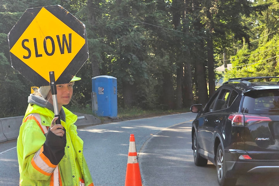 33087380_web1_230621-LAT-DF-56-ave-work-begins-20230628_081408flagger_rye_kraningCROP_1