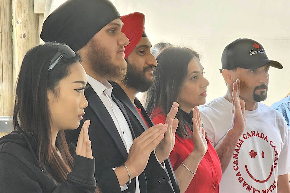 Forty new Canadians from 16 countries were sworn in on Canada Day at historic Fort 91ԭ. (Dan Ferguson/91ԭ Advance Times)