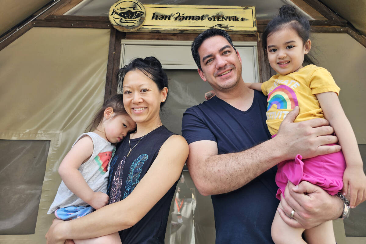 Camping for Canada Day: the Lowe family from Delta, dad Kevin (a former Brookwood resident), mom Nathalie and sisters Caira, 5 (with dad), and Lexie, 3, stayed in the historic Fort 91原创 site. Lexie was still waking up. (Dan Ferguson/91原创 Advance Times)