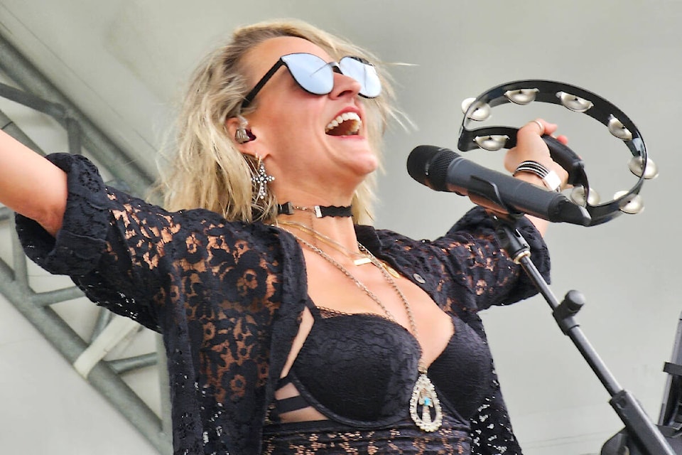 An estimated 500 music fans attended the Summer Beats concert in 91ԭ City’s Douglas Park on Saturday, July 15, to be entertained by musical groups including Nite Brite, an 80’s tribute band, whose singer channeled the early Madonna. (Dan Ferguson/91ԭ Advance Times)