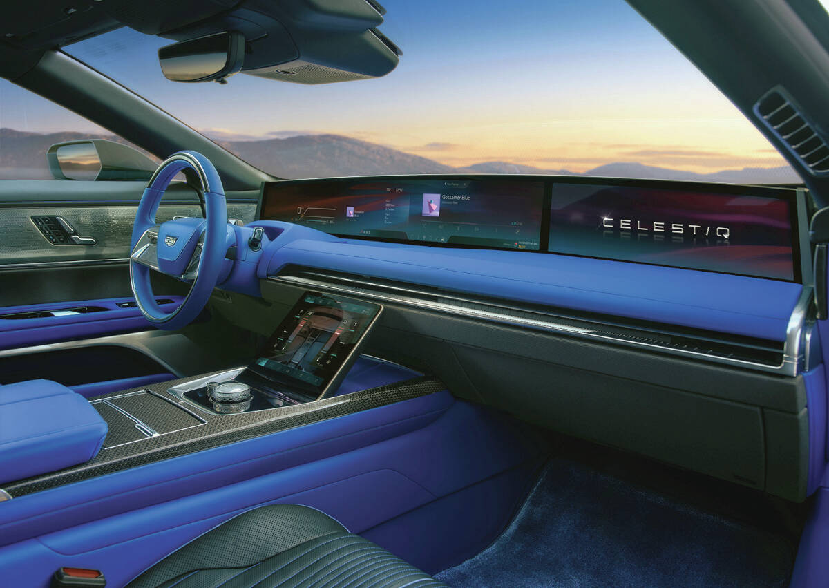 A sprawling 55-inch display panel runs the width of the dash. Theres also an 11-inch tablet-style screen located in the console. PHOTO: CADILLAC
