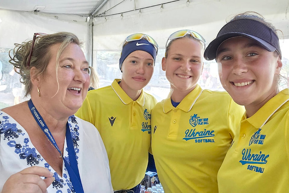 Veronica Cave, owner of Veronica’s Gourmet Perogies in Aldergrove, spoke with members of Team Ukraine at the 2023 Canada Cup fastpitch tournament at Softball City in Surrey on Tuesday, July 11. Her Aldergrove business donated 60 dozen perogies to Team Ukraine Night . (Special to Black Press Media)