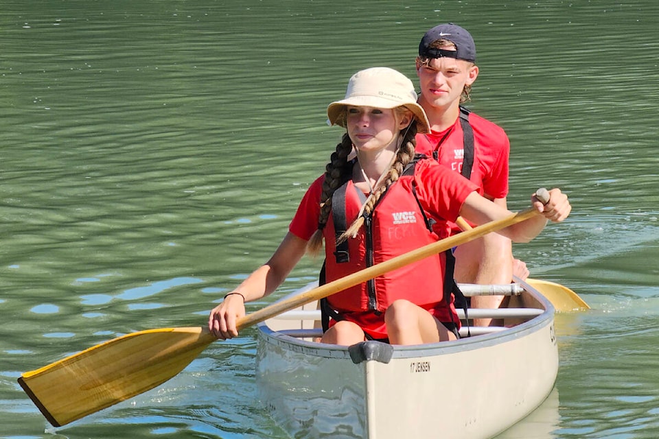 Paige Bateman and Zach Salisbury took to Bedford Channel in Fort Langley on Sunday morning. They were among the expert volunteers on hand for the Fort Canoe and Kayak Club open house held Sunday, July 23. (Dan Ferguson/Langley Advance Times)