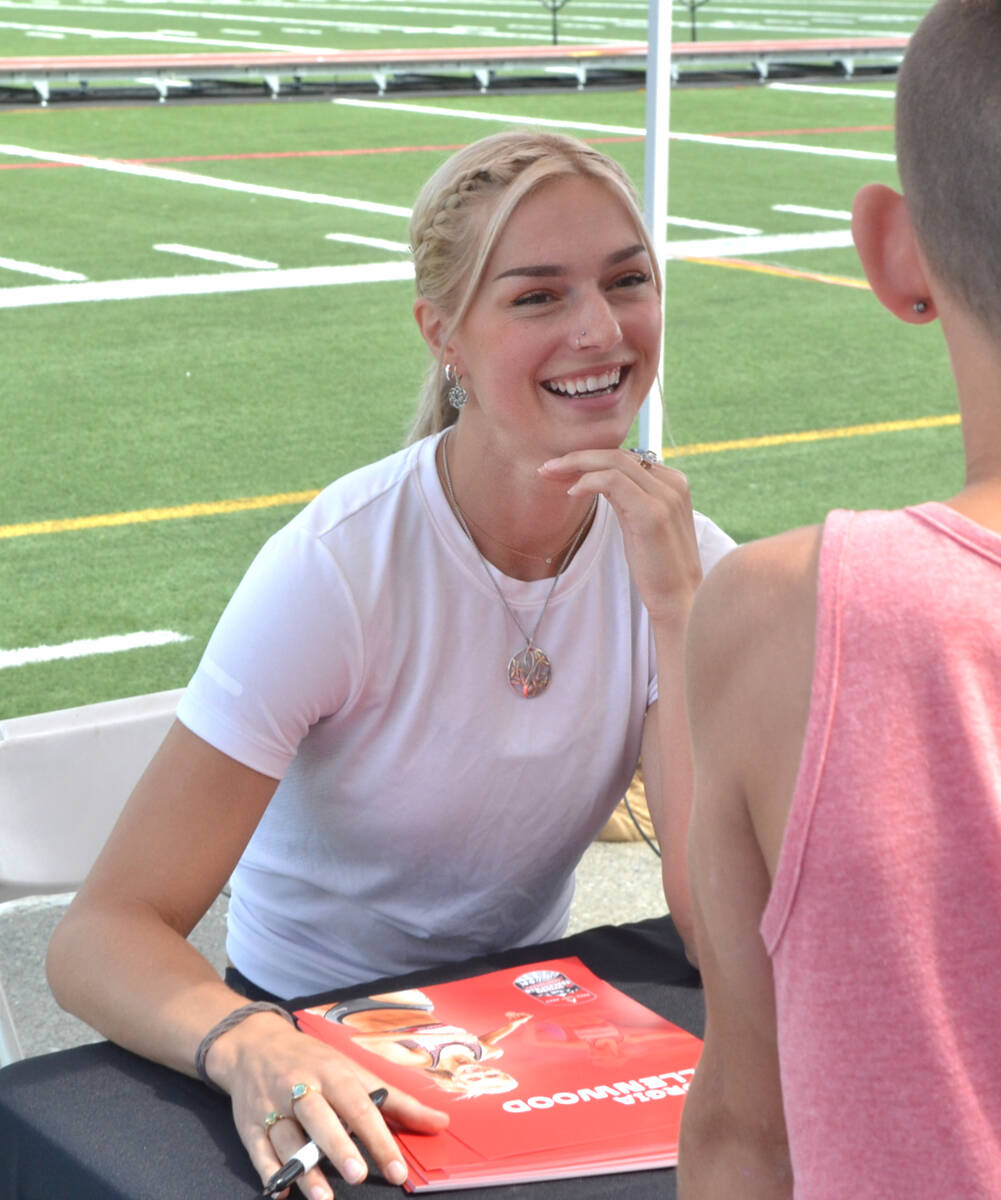 Georgia Ellenwood participated in autograph signing after the question and answer period on Wednesday, July 26. (Kyler Emerson/Langley Advance Times)