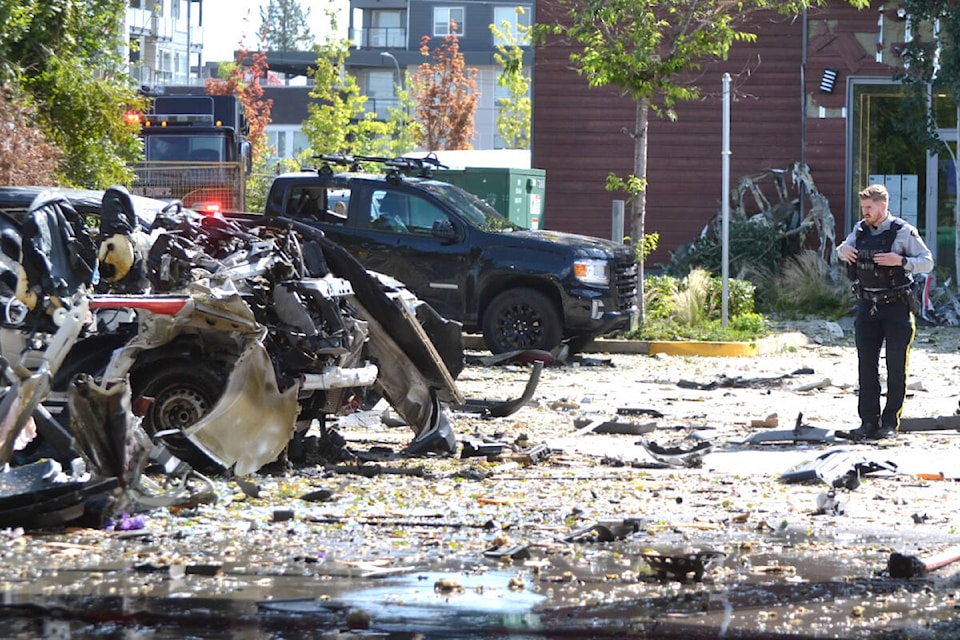 A vehicle was destroyed by a powerful blast in the parking lot in the Willoughby Town Centre on Wednesday, July 26. (Kyler Emerson/)