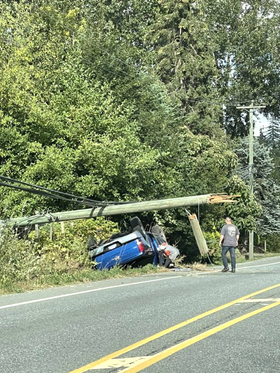 A single-car crash involving a Dodge Ram pick-up truck resulted in a power outage for residents in the area of 16th Avenue and 232nd Street Wednesday evening (Aug. 9) around 5:30 p.m. (Tammy Nielsen, an EMT, gave first aid until first responders arrived on scene/Special to 91ԭ Advance Times)
