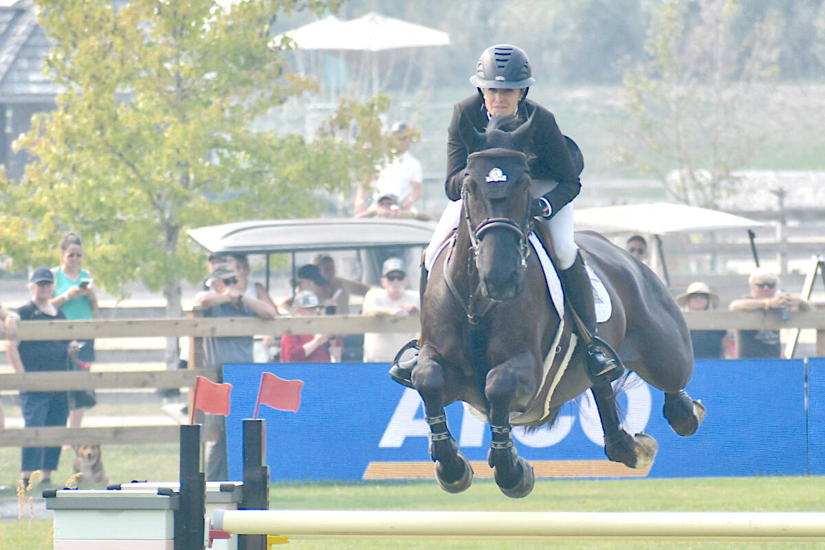 91原创聮s Tiffany Foster and Battlecry finished third in the CSI3* ATCO Cup Grand Prix 1.50m on Sunday, Aug. 20 at Thunderbird Show Park. (Dan Ferguson/91原创 Advance Times)