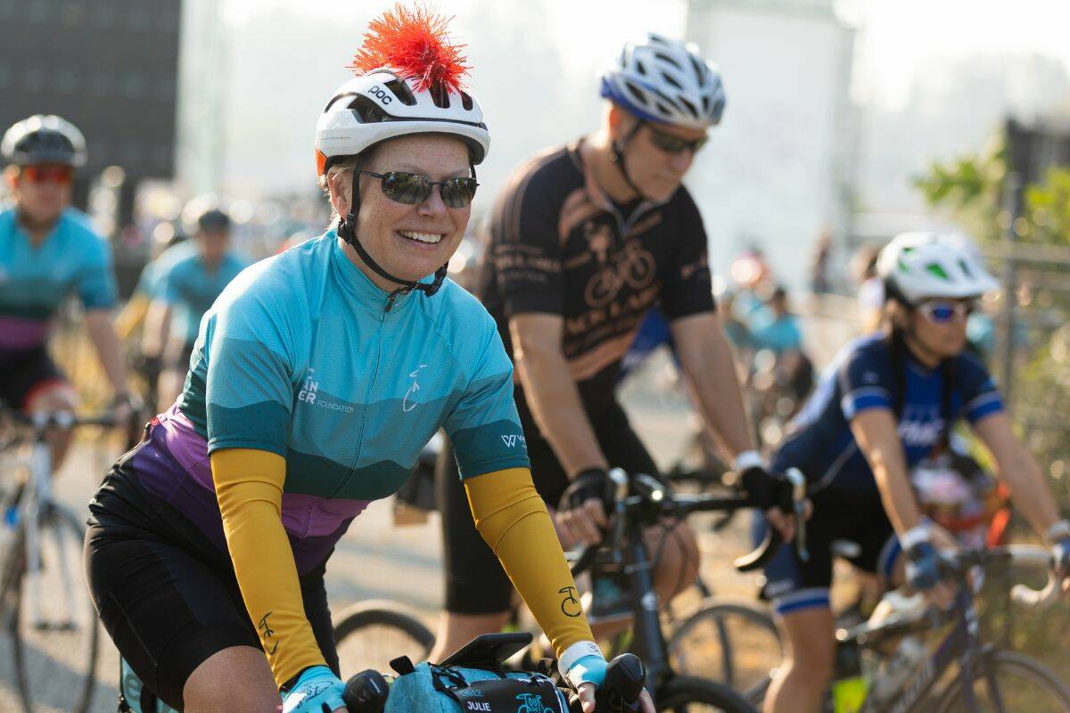Cancer survivors can be seen wearing yellow sleeves at the start of the Tour de Cure in Cloverdale on Aug. 26, 2023. (Photo: Anna Burns)