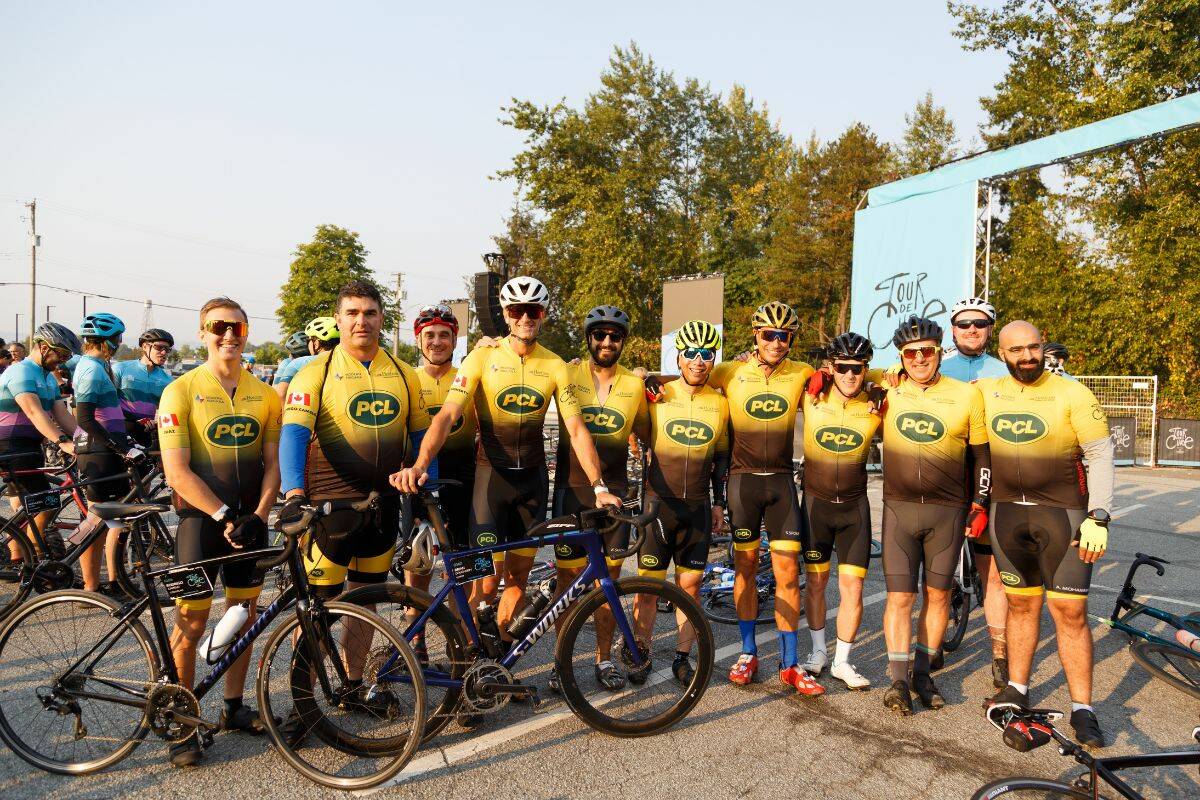 Brian Dougherty poses for a photo with the PCL team at the start of the Tour de Cure in Cloverdale on Aug. 26, 2023. (Photo: Anna Burns)