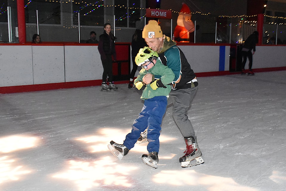Waymon Card, 7, learns to skate with his father Bill, during a Winter Wonderland holiday-themed public skate at Pitt Meadows Arena on Monday, Dec. 23.  