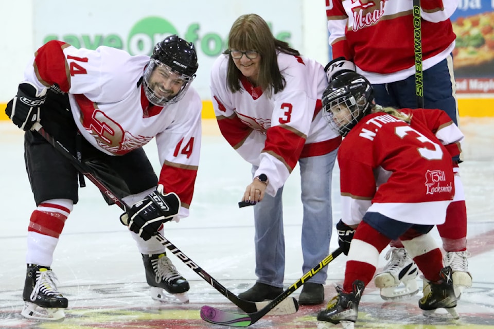 Lorraine Trulsen (centre) helped raise nearly $7,000 at the Noah Trulsen Memorial Charity Game on Nov. 9.